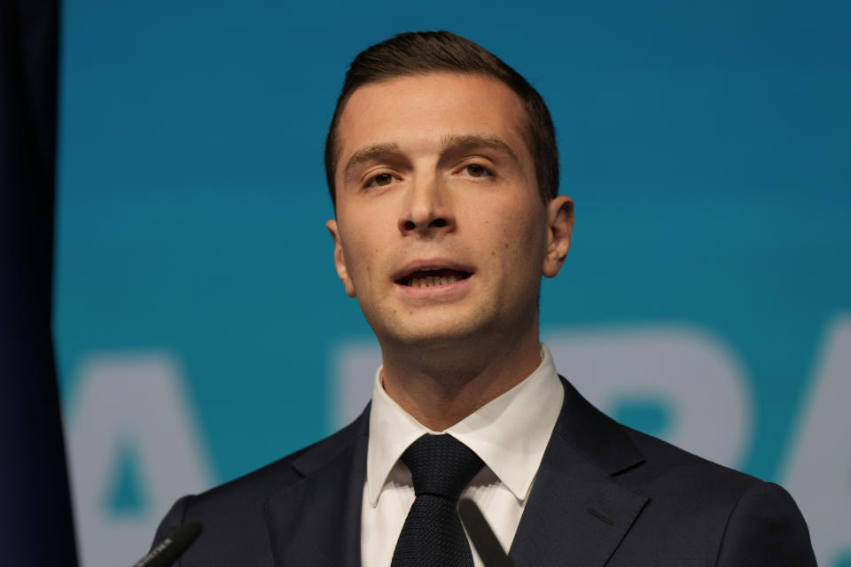 Far-right National Rally lead candidate Jordan Bardella delivers a speech at the party election night headquarters, Sunday, June 9, 2024 in Paris. First projected results from France put far-right National Rally party well ahead in EU elections, according to French opinion poll institutes. (AP Photo/Lewis Joly)