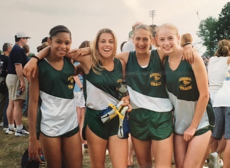 Before graduating in 2000, Nicole Ice was on the Aurora High School Girls Track 4 x 200 team. From left, Jerika Duncan (now a CBS news reporter), Ice, Olivia Peters and Becky Kohnz.