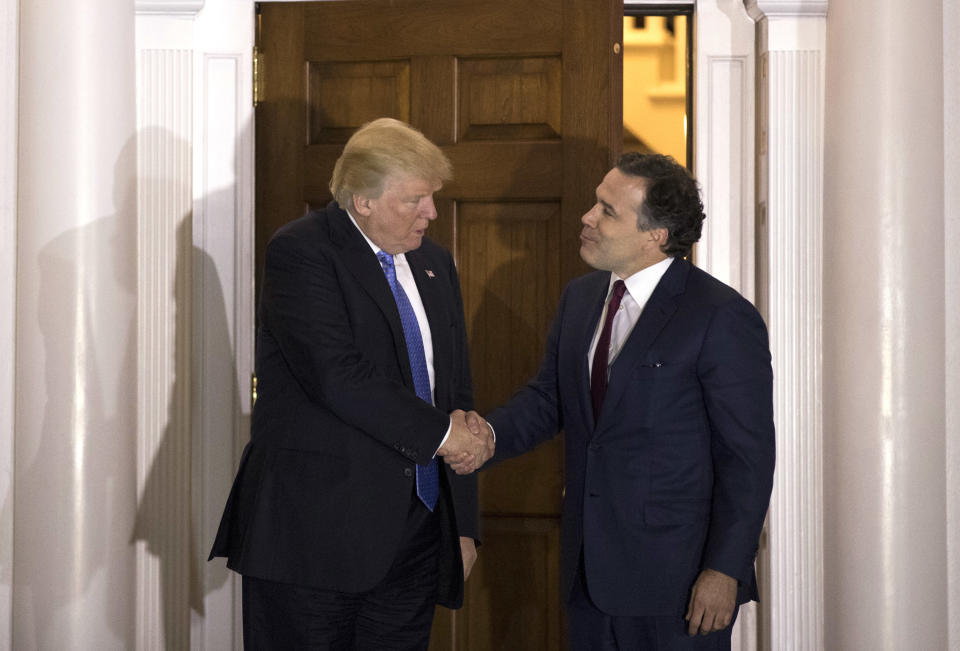 BEDMINSTER TOWNSHIP, NJ - NOVEMBER 20: (L to R) President-elect Donald Trump shakes hands with David McCormick, president of the management committee at Bridgewater Associates, following to their meeting at Trump International Golf Club, November 20, 2016 in Bedminster Township, New Jersey. Trump and his transition team are in the process of filling cabinet and other high level positions for the new administration.  (Photo by Drew Angerer/Getty Images)