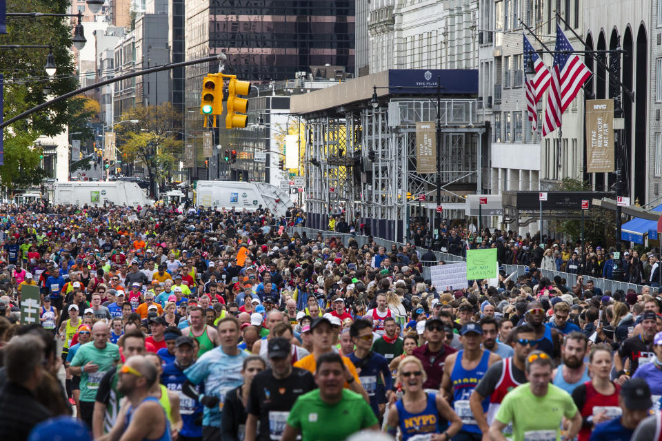 FILE - In this Nov. 3, 2019, file photo, runners take part in the New York City Marathon in New York. Non-profit organizations across the country are scrambling to keep their causes front of mind in the middle of the COVID-19 pandemic. Social distancing measures brought on by the coronavirus have forced non-profits that use participatory events like charity walks and runs as fundraisers are getting creative. (AP Photo/Eduardo Munoz Alvarez, File)