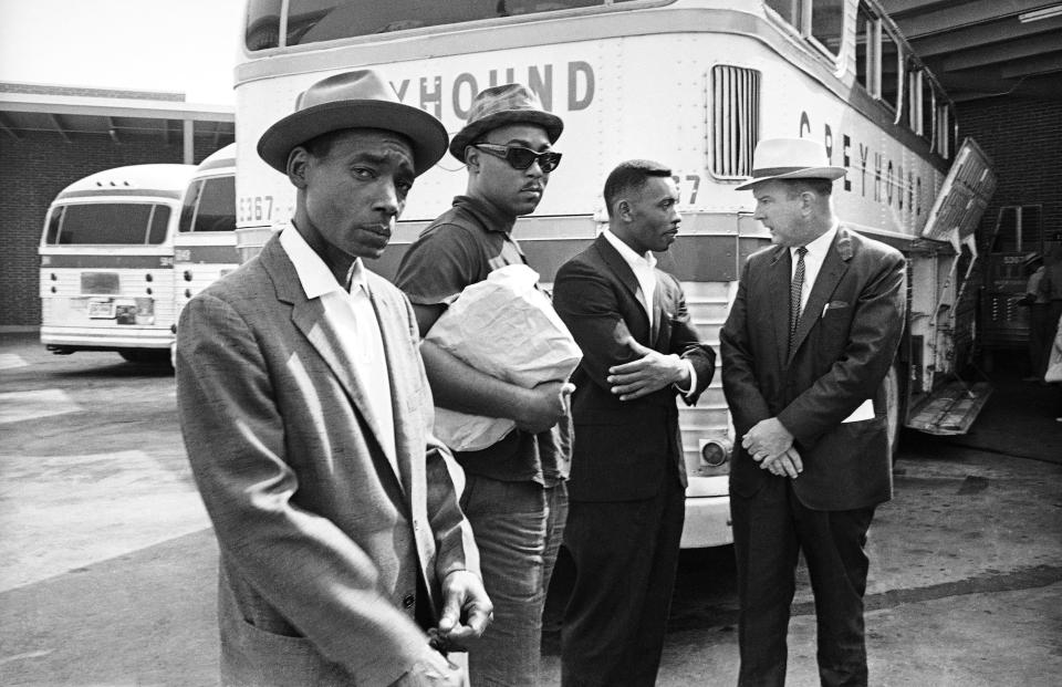 Three "Reverse Freedom Riders" left New Orleans for Concord, NH, on one-way bus tickets bought by the New Orleans Citizens Council. They are shown with Citizens Council director George Singlemann, right, July 20, 1962 in New Orleans. The reverse Freedom Riders are, from left, Eddie Rose, Almer Payton and Willie Ramsey.