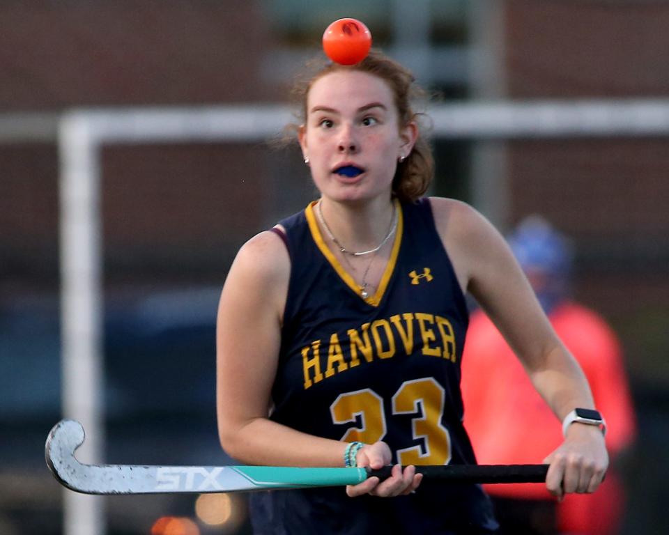 Hanover's Mae Buchanan eyes the ball after it popped up off her stick during fourth quarter action of their game at Hingham High School on Tuesday, Sept. 19, 2023. Hingham would go on to win 6-1.