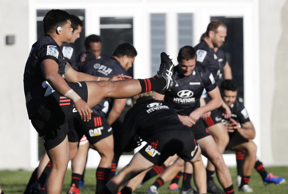 Crusaders players practice during a training session at Rugby Park in Christchurch, New Zealand, Wednesday, May 27, 2020. New Zealand's Super Rugby Aotearoa will start on June 13 in a new five-team, 10-week competition. (AP Photo/Mark Baker)