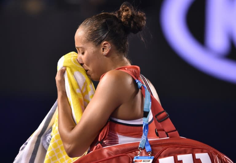 An emotional Madison Keys leaves the court after defeat to Zhang Shuai at the Australian Open on January 25, 2016