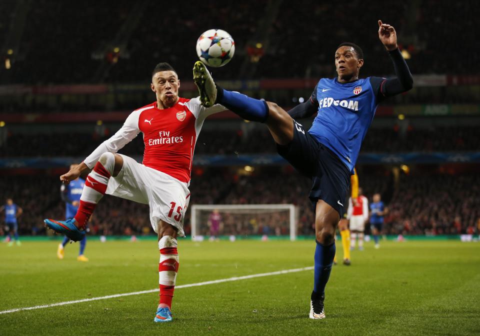 Football - Arsenal v AS Monaco - UEFA Champions League Second Round First Leg - Emirates Stadium, London, England - 25/2/15 Monaco's Anthony Martial in action with Arsenal's Alex Oxlade Chamberlain Action Images via Reuters / John Sibley Livepic EDITORIAL USE ONLY.