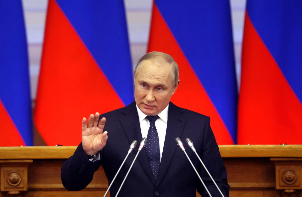 Vladimir Putin delivers a speech during a meeting of the Council of Legislators on April 27.