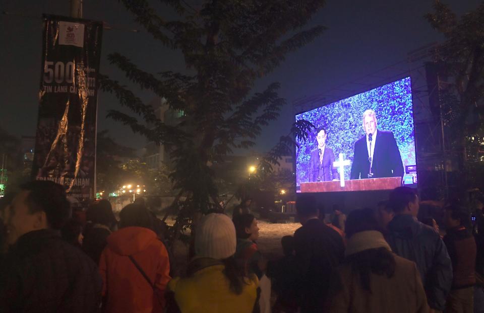 Graham addresses an evangelical event at a sports stadium in Hanoi, Vietnam, on Dec. 9, 2017. (Photo: HOANG DINH NAM via Getty Images)