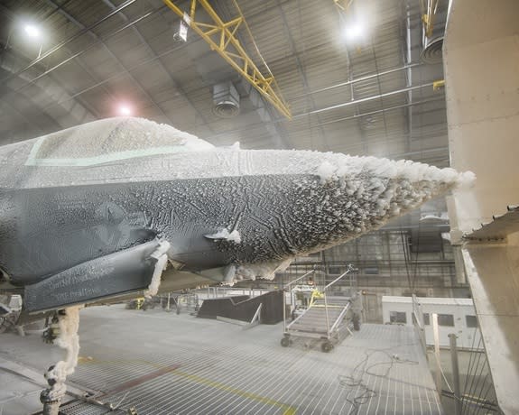 The F-35 Lightning II undergoes "ice evaluation testing" at a climactic laboratory in Florida.