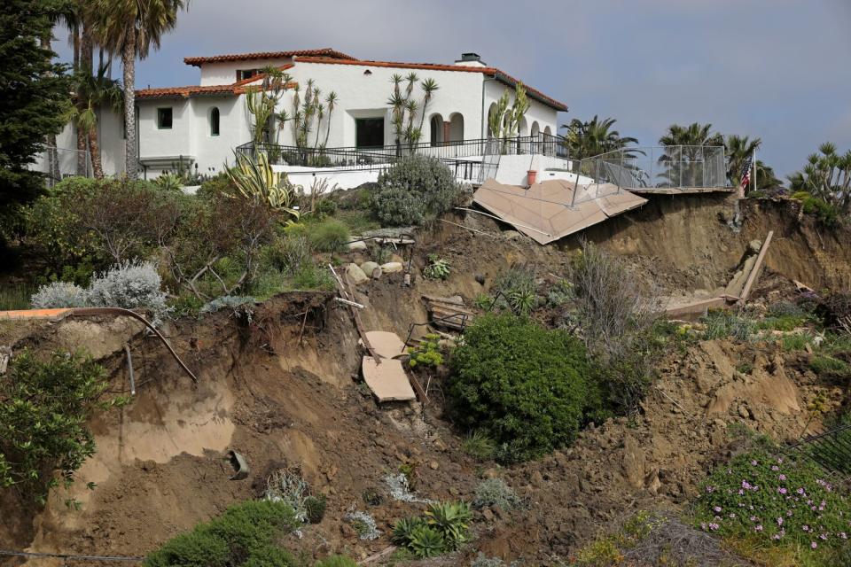 A recent landslide collapsed portions of the bluff beneath Casa Romantica in San Clemente.