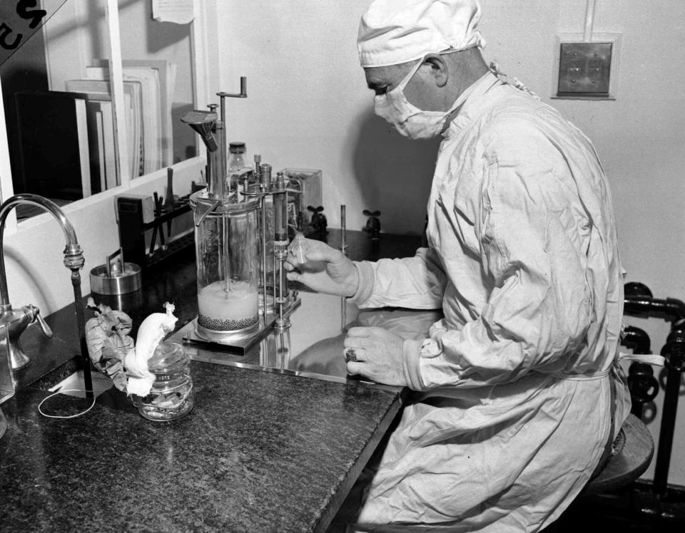 Filling a vial with vaccine