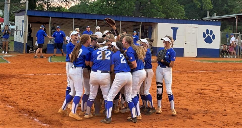 The Jay softball team celebrating after recording the final out of a 3-0 victory over Paxton in the Region 1-1A title game on Tuesday, May 17, 2022 from Jay High School.