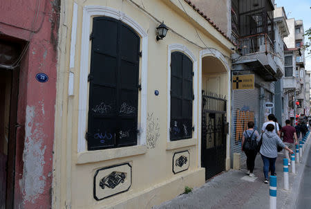 People walk past by Dirilis church in Izmir, Turkey April 15, 2018. REUTERS/Sadi Osman Temizel NO RESALES. NO ARCHIVES