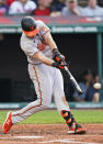 Baltimore Orioles' Ryan Mountcastle hits an RBI single during the third inning of the team's baseball game against the Cleveland Indians on Wednesday, June 16, 2021, in Cleveland. (AP Photo/Tony Dejak)