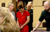 Nikolas Cruz, facing 17 charges of premeditated murder in the mass shooting at Marjory Stoneman Douglas High School in Parkland, appears in court for a status hearing in Fort Lauderdale, Florida, U.S. February 19, 2018. REUTERS/Mike Stocker/Pool