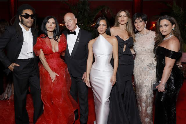 <p>Stefanie Keenan/VF24/WireImage for Vanity Fair </p> (L-R) Lenny Kravitz, Lauren Sánchez, Jeff Bezos, Kim Kardashian, Sofía Vergara, Kris Jenner, Demi Lovato