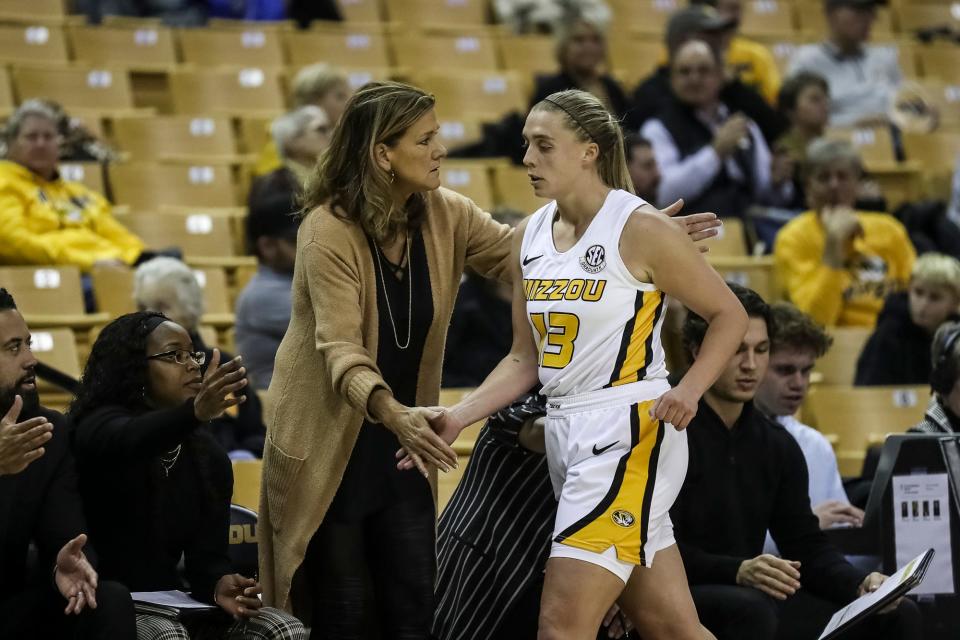Missouri Tigers head coach Robin Pingeton and guard Haley Troup (13) during the second half of the Tigers game against the Saint Louis Billikens, Wednesday at Mizzou Arena in Columbia, Mo.