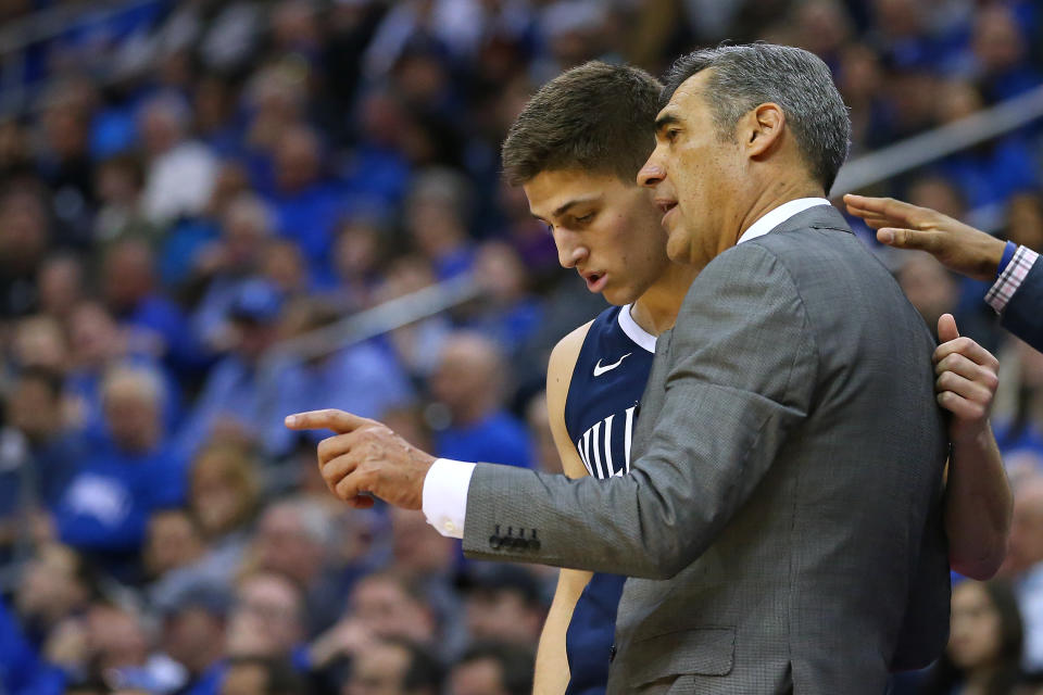 NEWARK, NJ - MARCH 09: Head coach Jay Wright of the Villanova Wildcats talks with Collin Gillespie #2 during the second half of a college basketball game against the Seton Hall Pirates at Prudential Center on March 9, 2019 in Newark, New Jersey. Seton Hall defeated Villanova 79-75. (Photo by Rich Schultz/Getty Images)