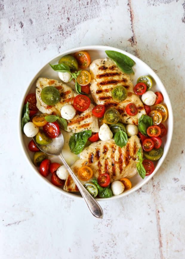 <p><a href="https://cravingcalifornia.com/grilled-chicken-with-marinated-tomatoes-and-fresh-mozzarella-5-ingredients/" rel="nofollow noopener" target="_blank" data-ylk="slk:Craving California;elm:context_link;itc:0;sec:content-canvas" class="link ">Craving California</a></p><p>This light and fresh grilled chicken is topped with marinated tomatoes, fresh basil and creamy mozzarella cheese.</p><p><strong>Get the recipe: <a href="https://cravingcalifornia.com/grilled-chicken-with-marinated-tomatoes-and-fresh-mozzarella-5-ingredients/" rel="nofollow noopener" target="_blank" data-ylk="slk:Grilled Chicken with Marinated Tomatoes and Fresh Mozzarella;elm:context_link;itc:0;sec:content-canvas" class="link ">Grilled Chicken with Marinated Tomatoes and Fresh Mozzarella</a></strong></p>