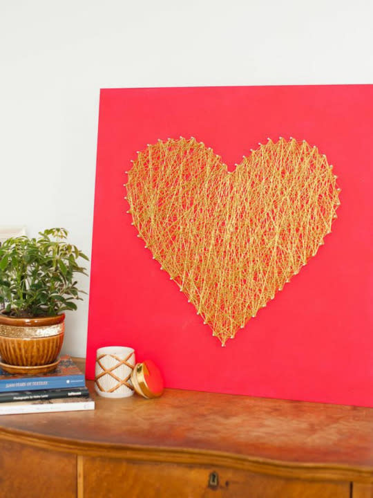 Make this inexpensive and modern string art heart for that special someone