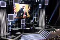 Host Anthony Anderson speaks as an image of Kanye West and President Donald Trump in the Oval Office appears on screen at the 50th annual NAACP Image Awards on Saturday, March 30, 2019, at the Dolby Theatre in Los Angeles. (Photo by Chris Pizzello/Invision/AP)