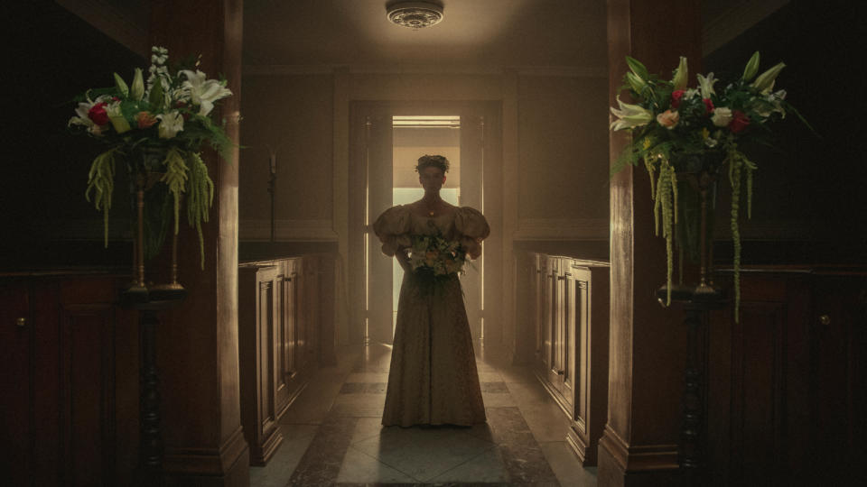 Polly Hillinghead walks down the aisle in Bodies episode 8 on Netflix.