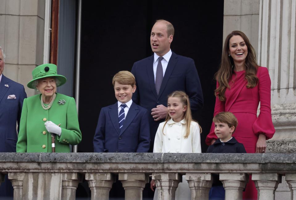From left, Britain's Queen Elizabeth II, Prince George, Prince William, Princess Charlotte, Prince Louis and Kate Duchess of Cambridge on the balcony during the Platinum Jubilee Pageant outside Buckingham Palace in London, Sunday June 5, 2022, on the last of four days of celebrations to mark the Platinum Jubilee. The pageant will be a carnival procession up The Mall featuring giant puppets and celebrities that will depict key moments from the Queen Elizabeth II’s seven decades on the throne. (Jonathan Buckmaster/Pool Photo via AP)