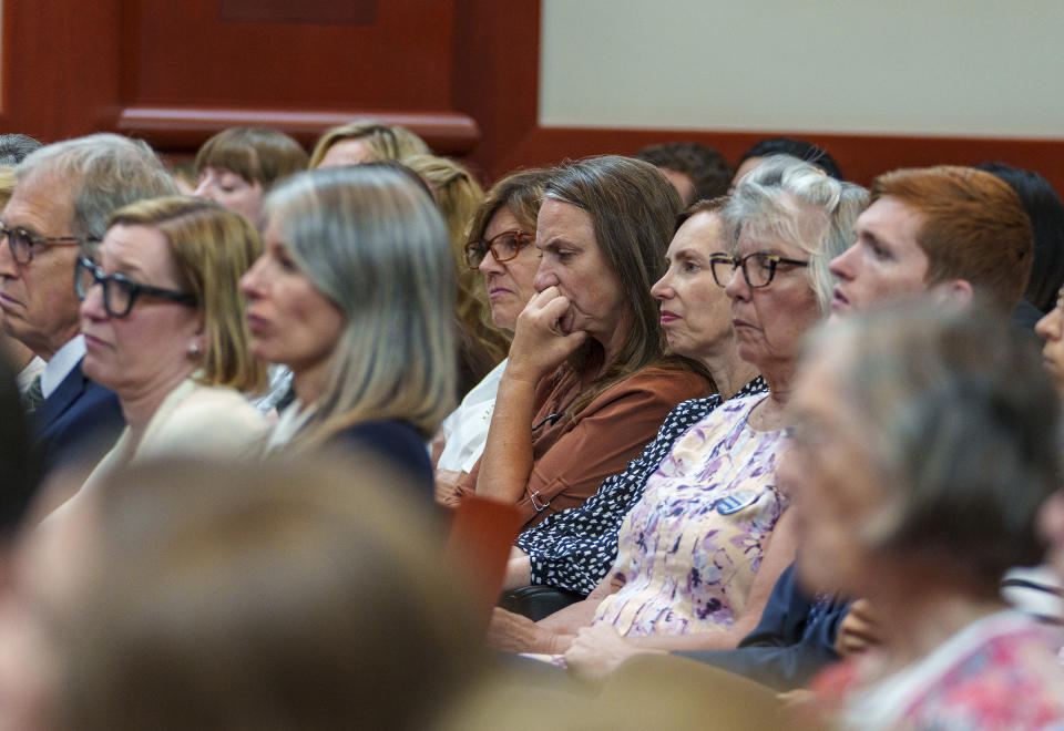 Members of the public listen to oral arguments at the Utah Supreme Court in Salt Lake City for a case challenging the state's congressional districts, Tuesday, July 11, 2023. (Leah Hogsten/The Salt Lake Tribune via AP, Pool)