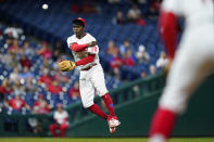 Philadelphia Phillies shortstop Didi Gregorius throws to first base after fielding a grounder by Baltimore Orioles' Kelvin Gutierrez during the sixth inning of an interleague baseball game, Tuesday, Sept. 21, 2021, in Philadelphia. Gutierrez was safe at first on a throwing error by Gregorius. (AP Photo/Matt Slocum)