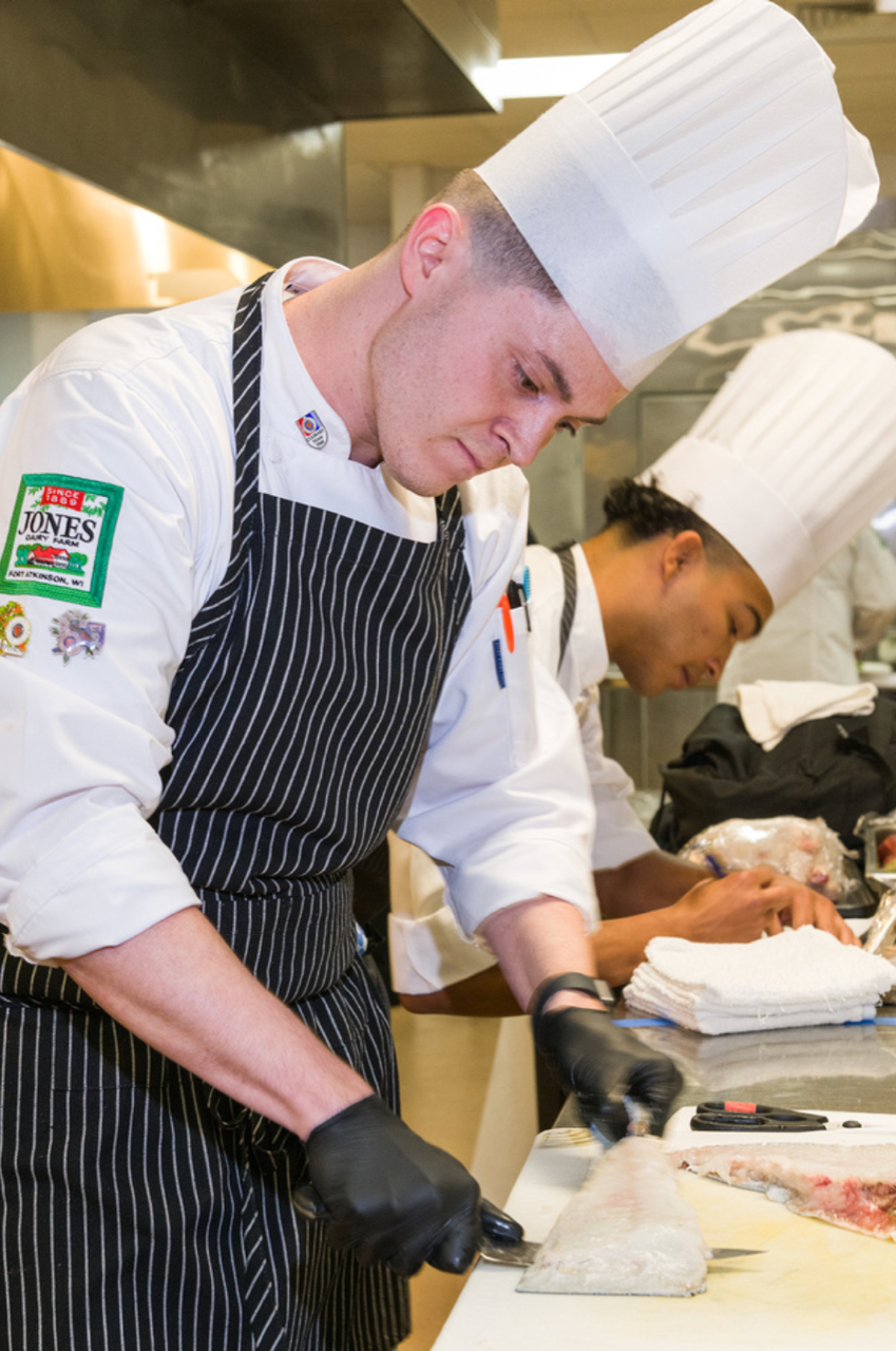 Chef Joe Baffoe competes in the 2022 Jeunes Chefs Rotisseurs Competition in Atlanta. Baffoe won the national competition.