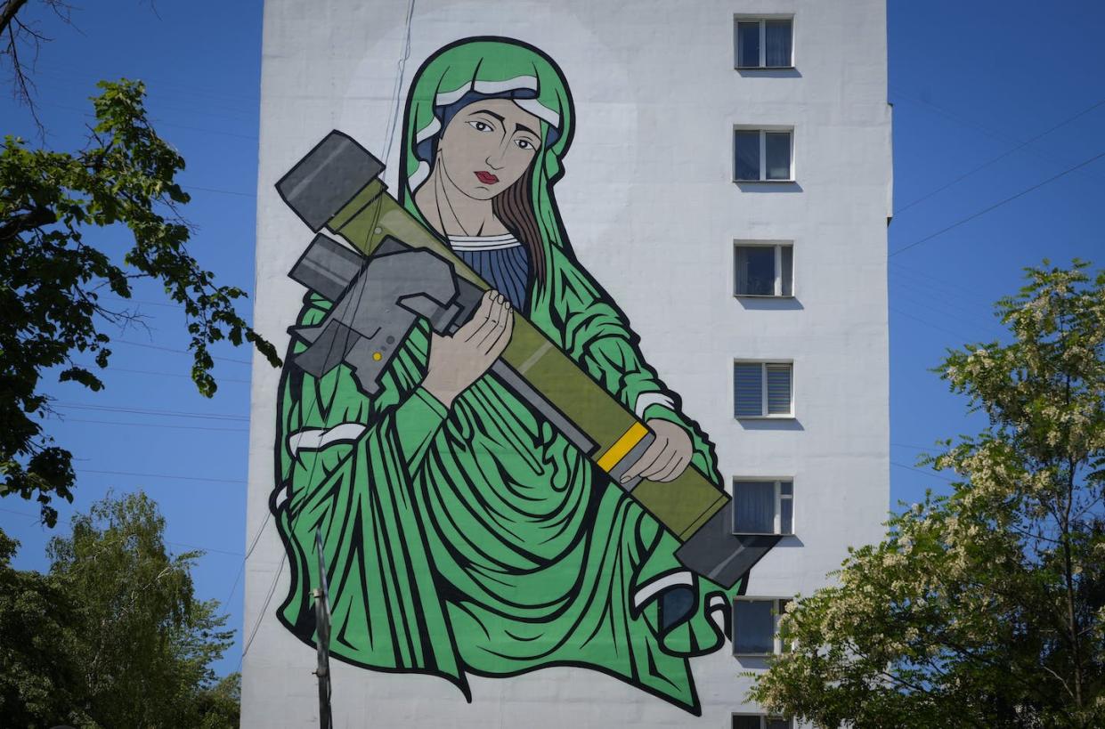 A mural in Kyiv depicts the Virgin Mary cradling a U.S.-made anti-tank weapon, a Javelin, which is considered a symbol of Ukraine's defense against Russia. <a href="https://newsroom.ap.org/detail/RussiaUkraineWar/26f26565d15c43dfa1ff107062c49a43/photo?Query=javelin&mediaType=photo&sortBy=arrivaldatetime:desc&dateRange=Anytime&totalCount=4051&currentItemNo=1" rel="nofollow noopener" target="_blank" data-ylk="slk:AP Photo/Efrem Lukatsky;elm:context_link;itc:0;sec:content-canvas" class="link ">AP Photo/Efrem Lukatsky</a>