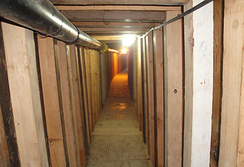 In this undated photo provided by the United States Drug Enforcement Administration, shows a 240-yard, a complete and fully operational tunnel that ran from a small business in Arizona to an ice plant on the Mexico side of the border, Thursday, July 12, 2012, in San Luis, Ariz.(AP Photo/Drug Enforcement Administration)