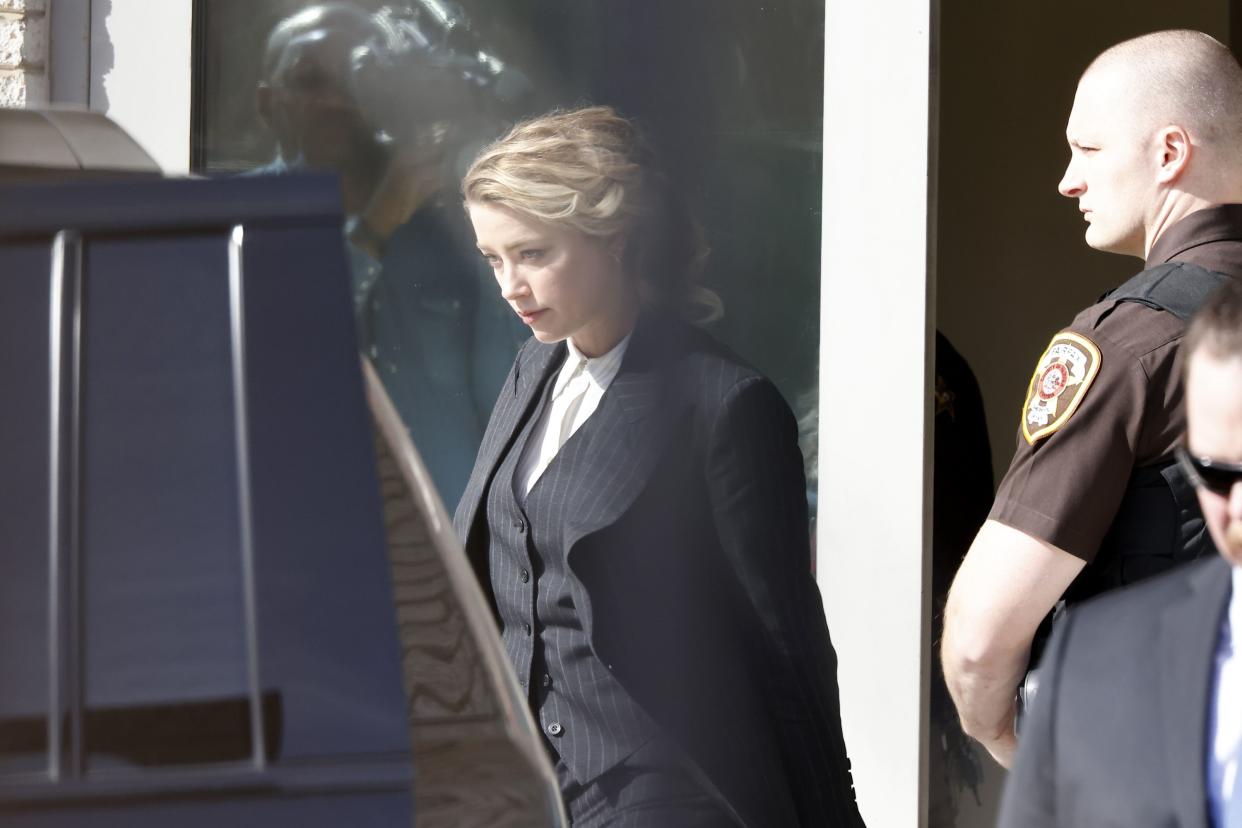 Amber Heard is seen outside court for the start of a civil trial at Fairfax County Circuit Court on April 11, 2022, in Fairfax, Virginia. Depp is seeking $50 million in alleged damages to his career over an op-ed Heard wrote in the Washington Post in 2018.