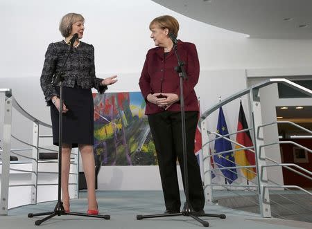 German Chancellor Angela Merkel and Britain's Prime Minister Theresa May address the media prior to a meeting at the chancellery in Berlin, Germany, November 18, 2016. REUTERS/Michael Sohn/Pool