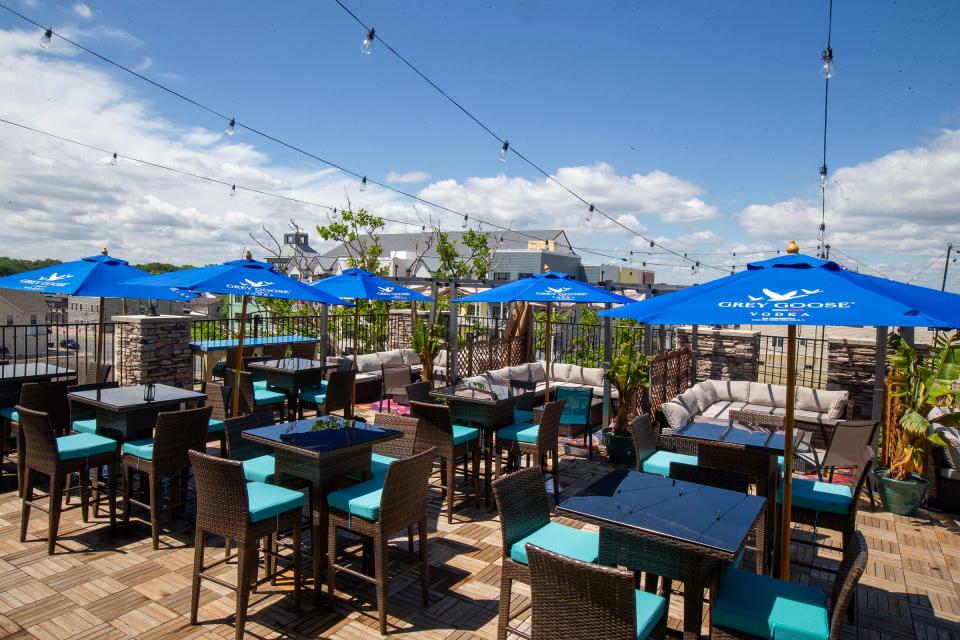 View from the rooftop lounge area of The Beach Gallery, a triple decker multi-purpose building with a cafe, brunch dining room, tea room and rooftop bar, in Keansburg.