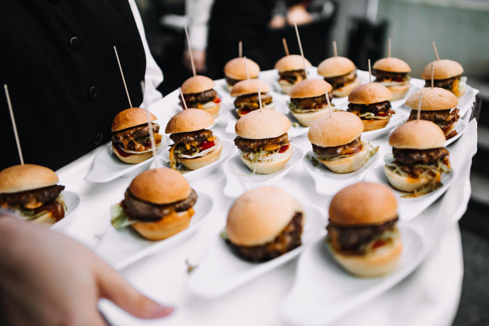 Sliders with toothpicks on a plate