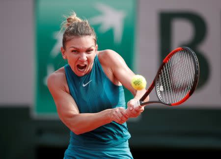 FILE PHOTO: Tennis - French Open - Roland Garros, Paris, France - June 9, 2018 Romania's Simona Halep in action during the final against Sloane Stephens of the U.S. REUTERS/Benoit Tessier/File Photo