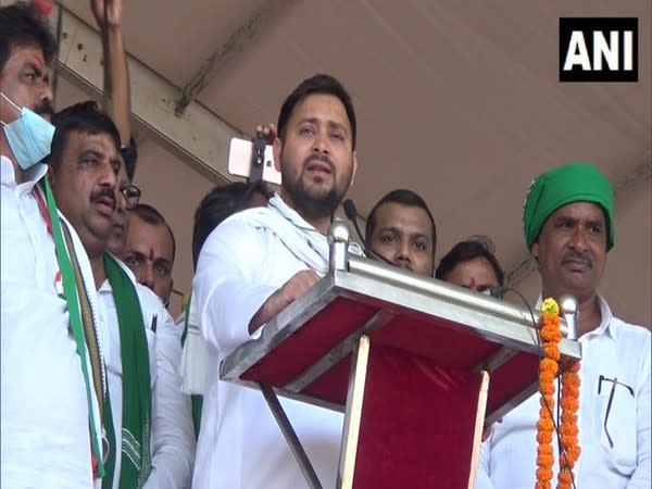 RJD leader Tejashwi Yadav speaking at the election rally in Gaya on Sunday. Photo/ANI