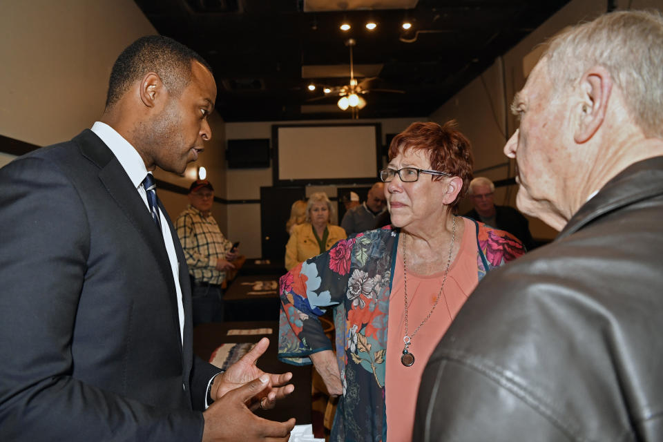 Kentucky Attorney General and Kentucky gubernatorial candidate Daniel Cameron speaks with supporters during a campaign stop in Richmond, Ky., Wednesday, May 3, 2023. (AP Photo/Timothy D. Easley)