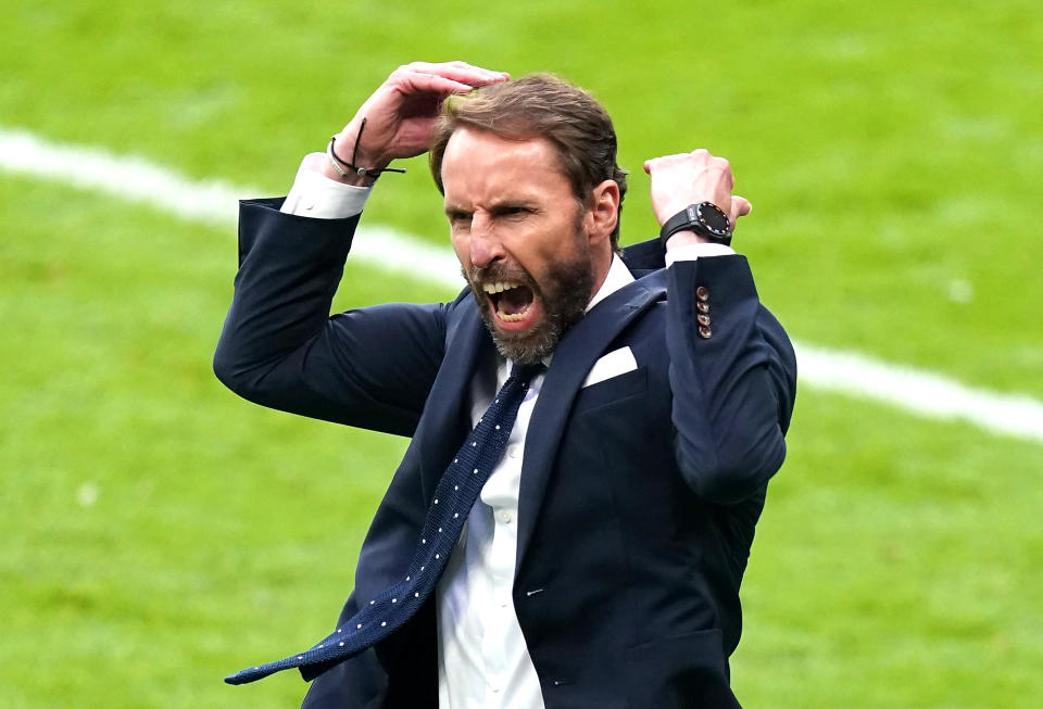 England manager Gareth Southgate celebrates his side's second goal of the game, scored by Harry Kane during the UEFA Euro 2020 round of 16 match at Wembley Stadium, London. Picture date: Tuesday June 29, 2021.