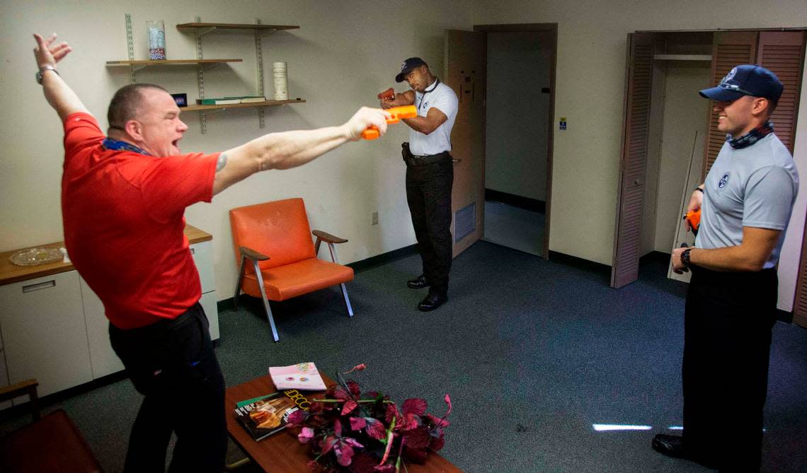 KeVonn Mabon, 27, decides when to pull the trigger during scenario training at the St. Petersburg police academy in December 2020.