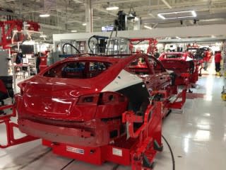 Red 2013 Tesla Model S cars roll down the production line (Photo: @elonmusk on Twitter)