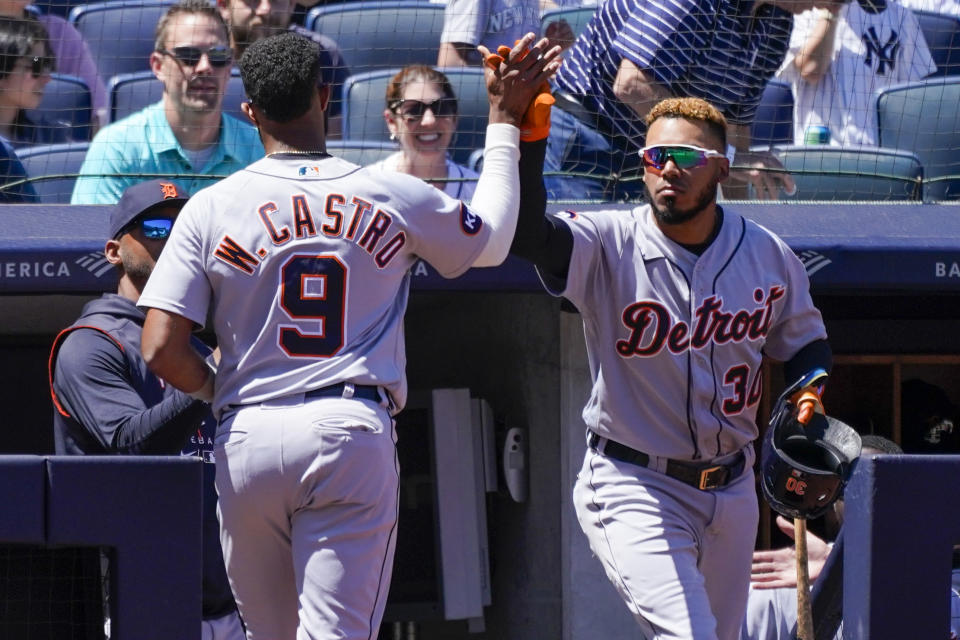 Detroit Tigers' Willi Castro (9) celebrates with Harold Castro (30) after scoring off and an RBI-single by Willi Castro in the eighth inning of a baseball game against the New York Yankees, Sunday, June 5, 2022, in New York. (AP Photo/Mary Altaffer)