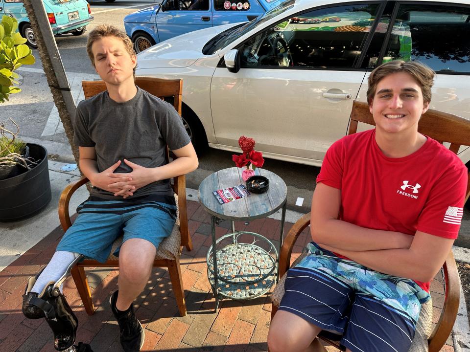 Joseph Tegerdine, left, with his brother, Langston, in Little Havana, Miami, Florida, in February 2024. Joseph Tegerdine, 18, had part of his right leg amputated after being diagnosed with osteosarcoma in 2018.