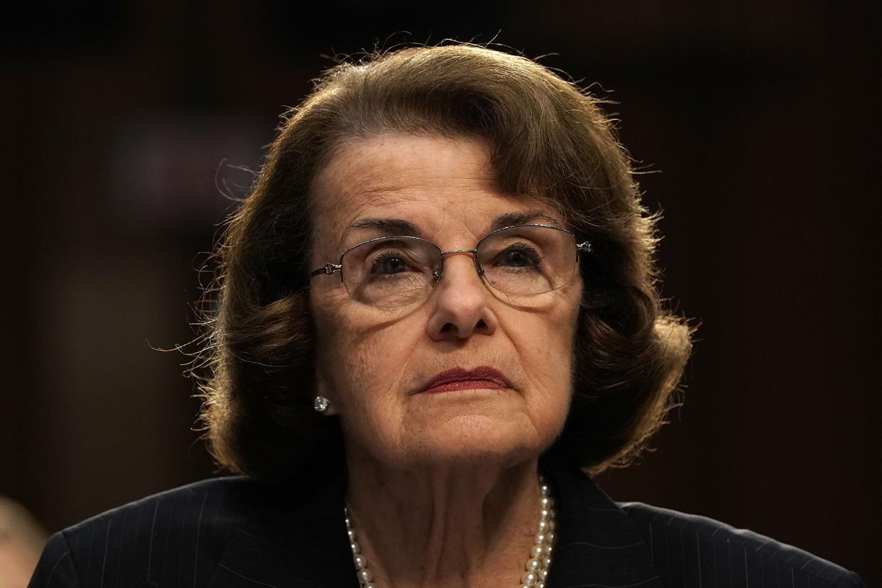 Dianne Feinstein stares ahead.