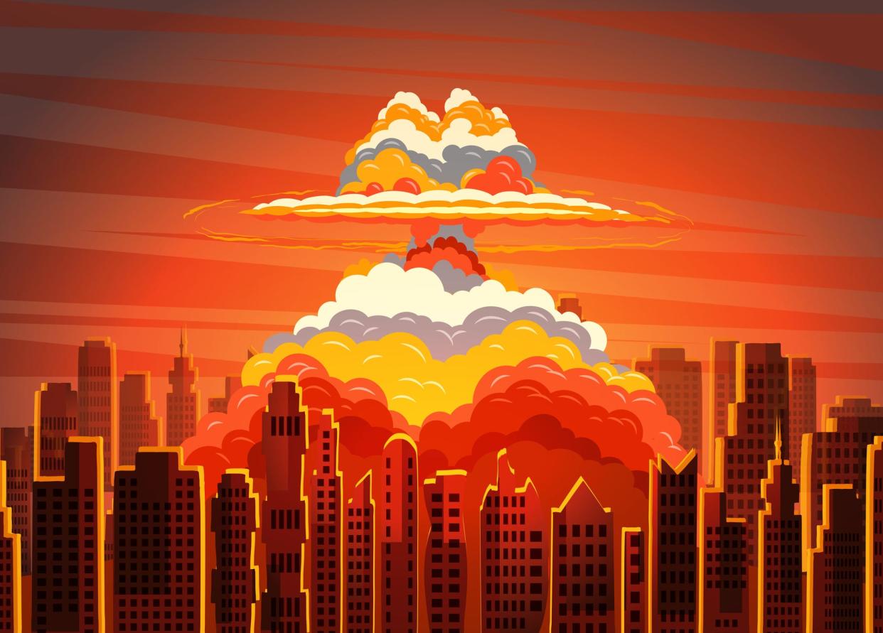 Cartoon of an atomic explosion over a populated city.