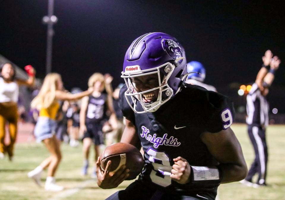 Shadow Hills' Greg Hollis III (9) celebrates scoring the game-winning touchdown with a second left on the clock on a quarterback keeper during the fourth quarter of their game at Shadow Hills High School in Indio, Calif., Friday, Sept. 8, 2023.