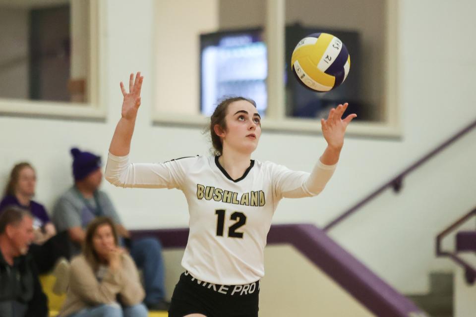 Bushland’s Madyson Eberly (12) serves the ball in a District 1-3A match against River Road, Tuesday, October 25, 2022, at River Road High School.  Bushland won 3-0