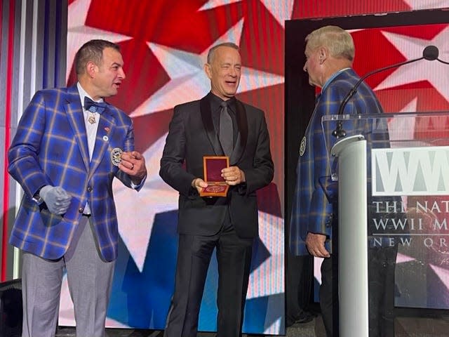 Sammy Lee Davis, right, presented actor Tom Hanks with the Bob Hope Entertainment Award at a Medal of Honor convention recently.