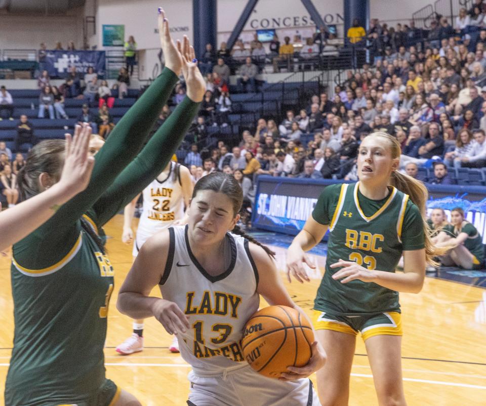 SJV Julia Karpell drives through traffic to shoot. St. John Vianney Girls basketball fefeats Red Bank Catholic 58-52 in Shore Conference Final in West Long Branch on February 19, 2023