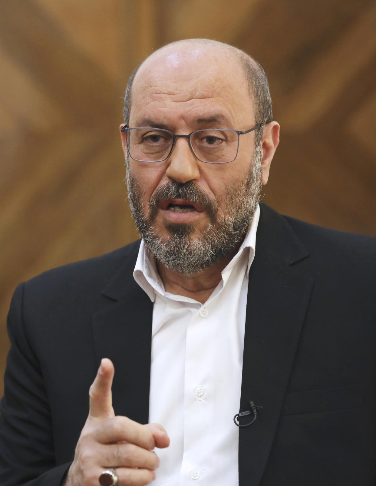 Gen. Hossein Dehghan, a military advisor to Iran's Supreme Leader Ayatollah Ali Khamenei, speaks during an interview with The Associated Press in Tehran, Iran, Wednesday, Nov. 18, 2020. Dehghan, who is a possible 2021 presidential candidate, warned that any American attack on the Islamic Republic could set off a "full-fledged war" in the Mideast in the waning days of the Trump administration. (AP Photo/Vahid Salemi)